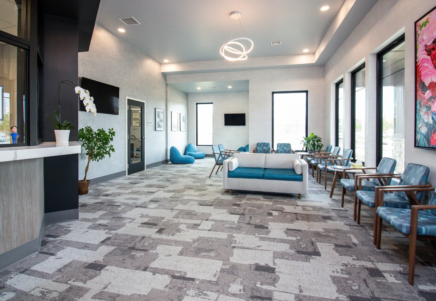 The modern and spacious waiting room at the Middleton Family Dentistry Oak Court location.